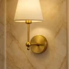 Seinävalaisin Linento Lighting BRZ-540061, ø10-15cm, E27, max. 40W, IP20, kulta/valkoinen
